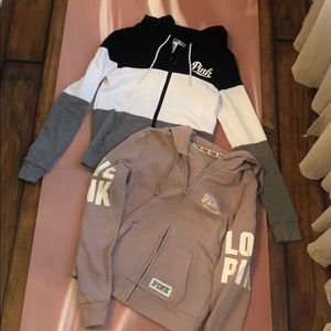 Two Victoria’s Secret hooded zip up sweatshirts